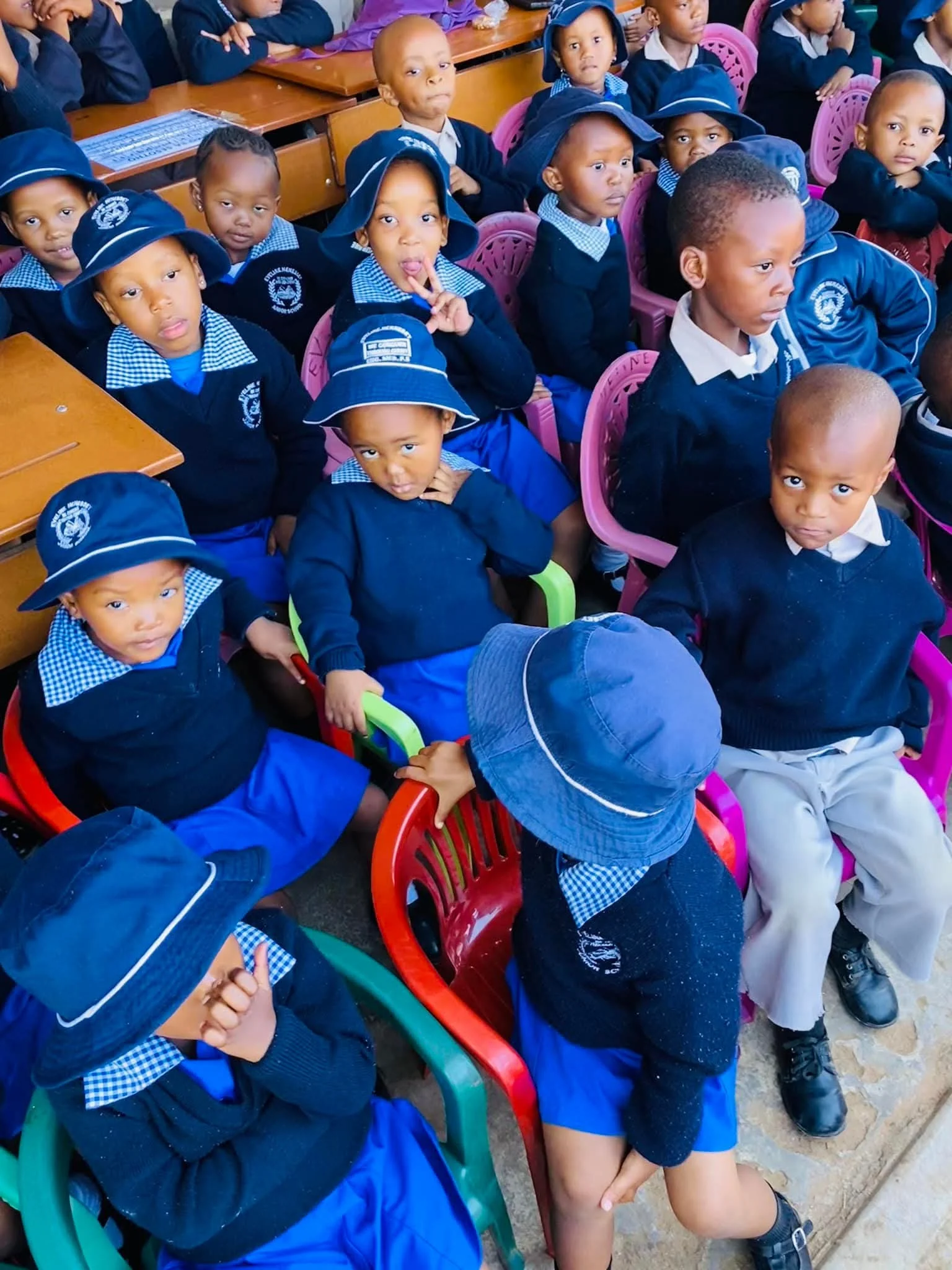 Young preschool children playing and learning together in a nurturing classroom environment